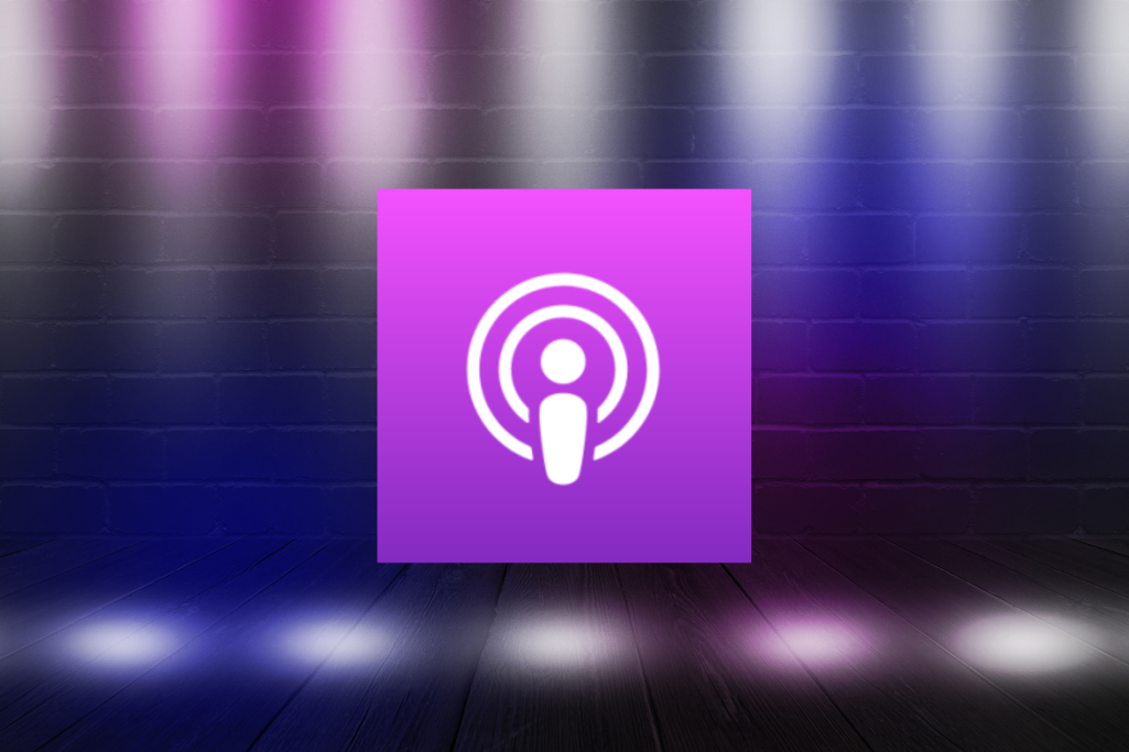 Purple podcast icon with a microphone symbol against a blurred background.